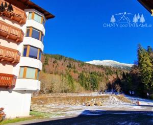 Priestranný byt s garážou Rezidencia Romantika Trangoška 