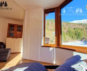 Priestranný byt s garážou Rezidencia Romantika Trangoška 