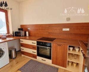 Priestranný byt s garážou Rezidencia Romantika Trangoška 