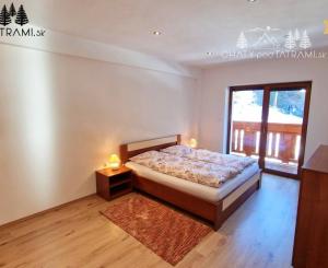 Priestranný byt s garážou Rezidencia Romantika Trangoška 