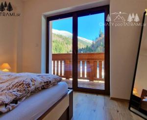 Priestranný byt s garážou Rezidencia Romantika Trangoška 