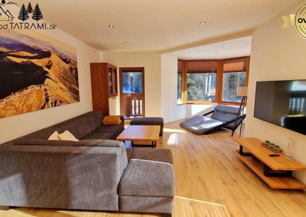 Priestranný byt s garážou Rezidencia Romantika Trangoška 