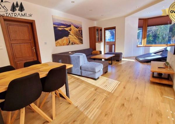 Priestranný byt s garážou Rezidencia Romantika Trangoška 