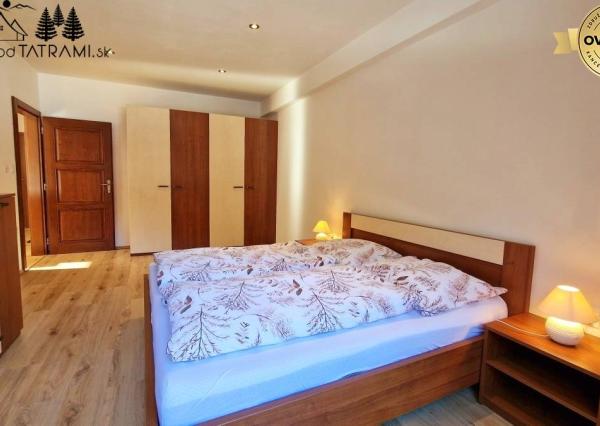 Priestranný byt s garážou Rezidencia Romantika Trangoška 